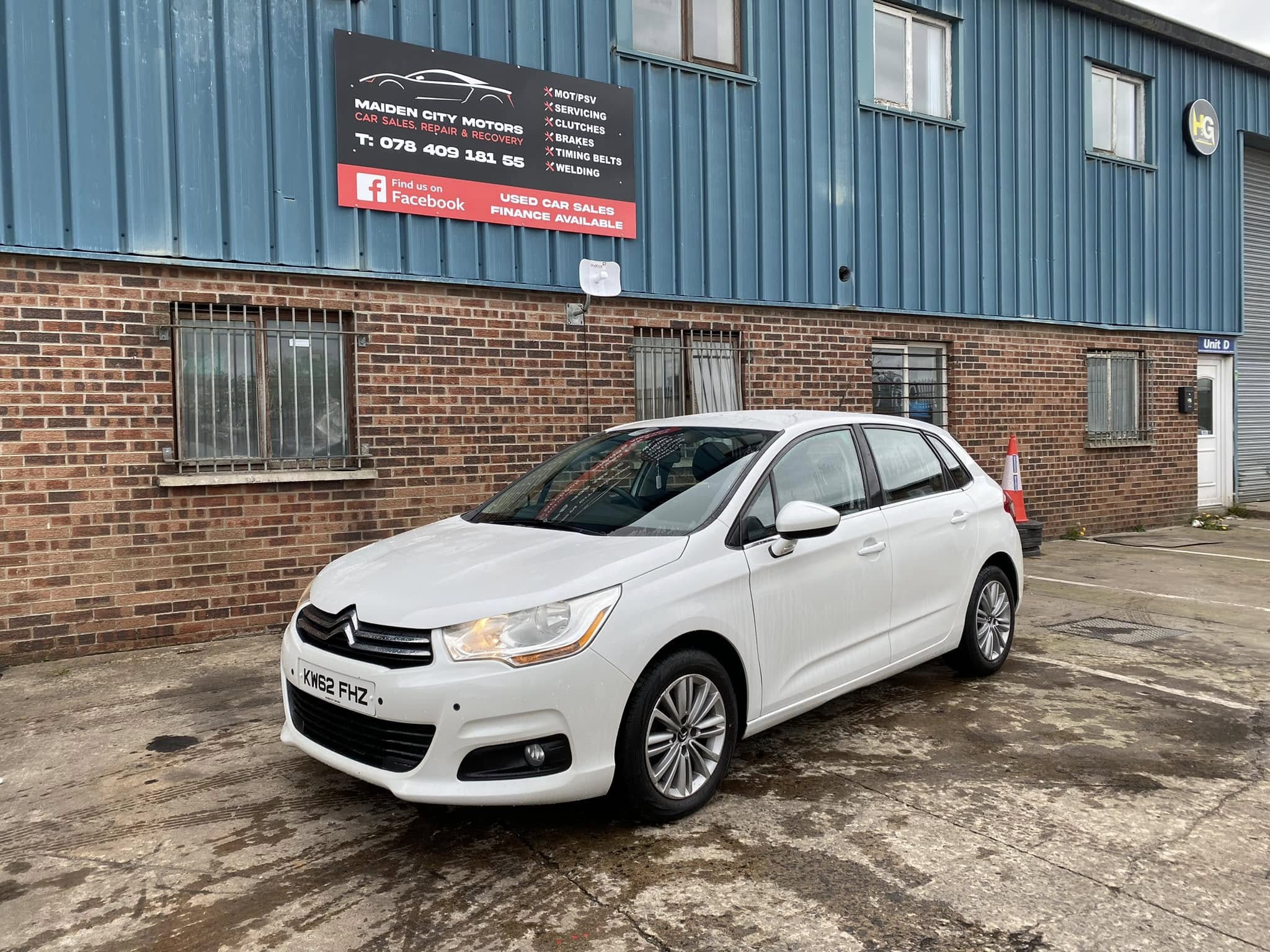 Value used car outside Maiden City Motors