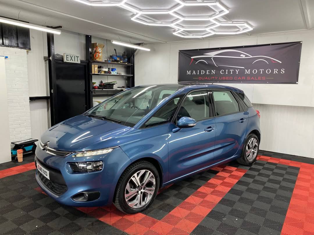 Blue Citroen inside the Maiden City Motors workshop